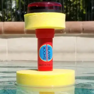ShockAlarm device floating in water